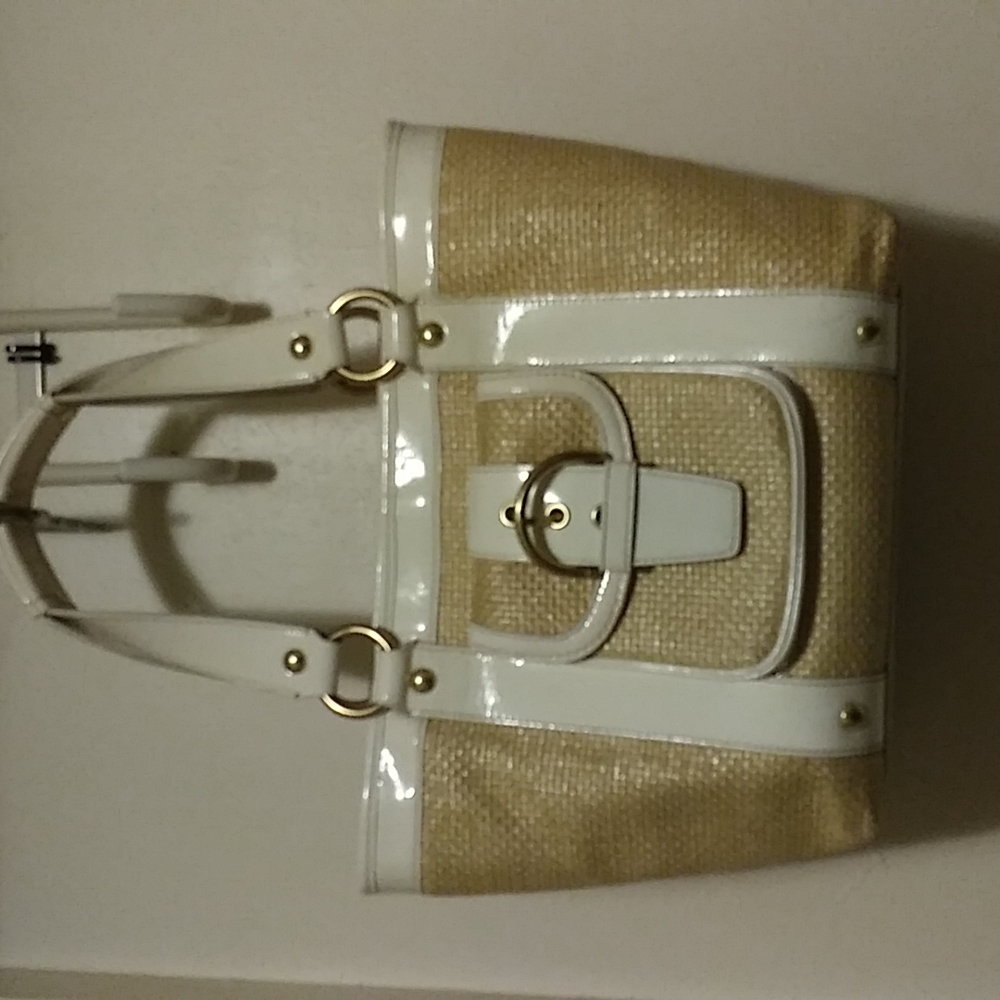 Coach white leather and straw tote.